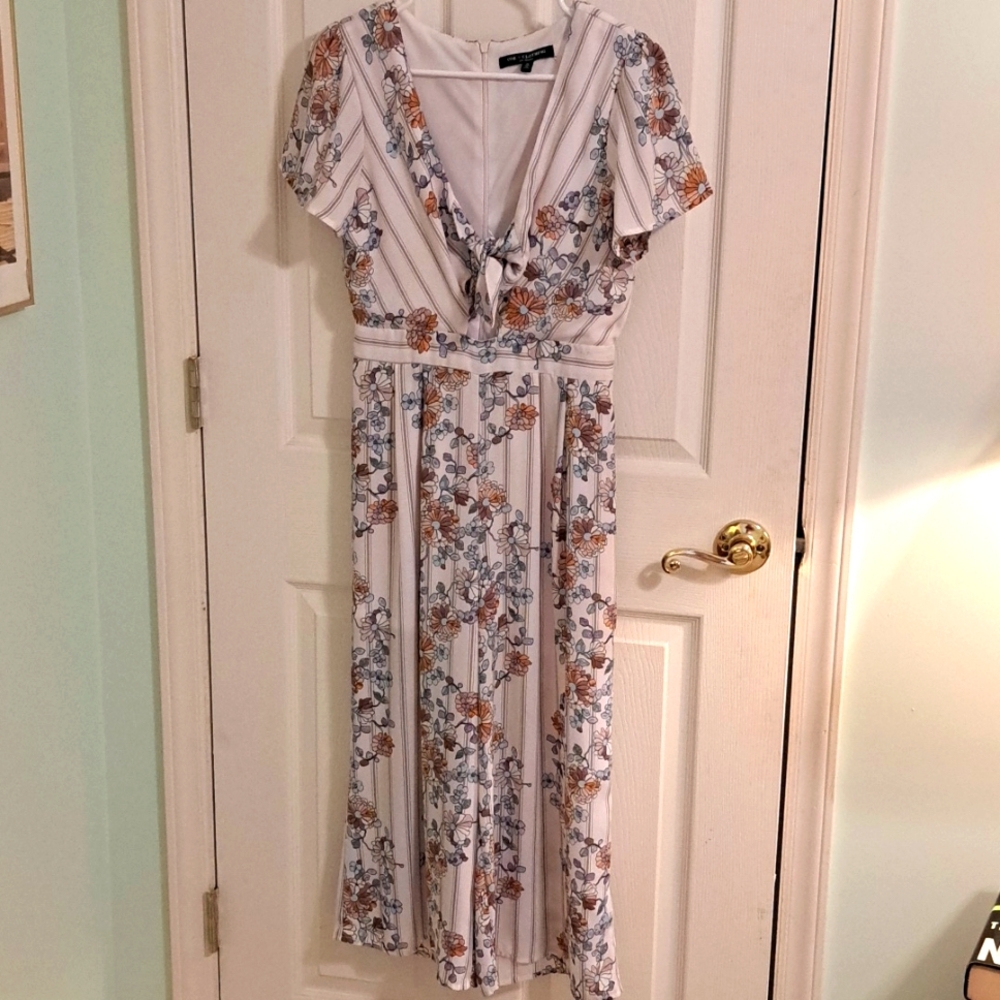 Women's jumpsuit, Size- Small White with blue/tan flowers One  Clothing brand